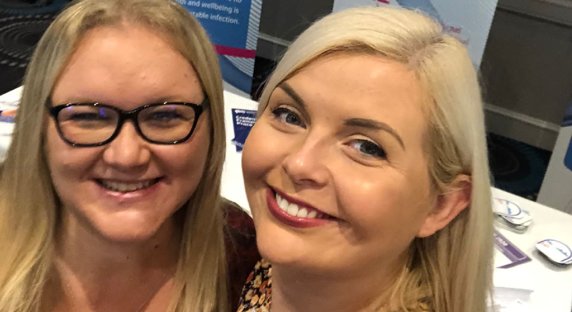 Women smiling at IPS conference